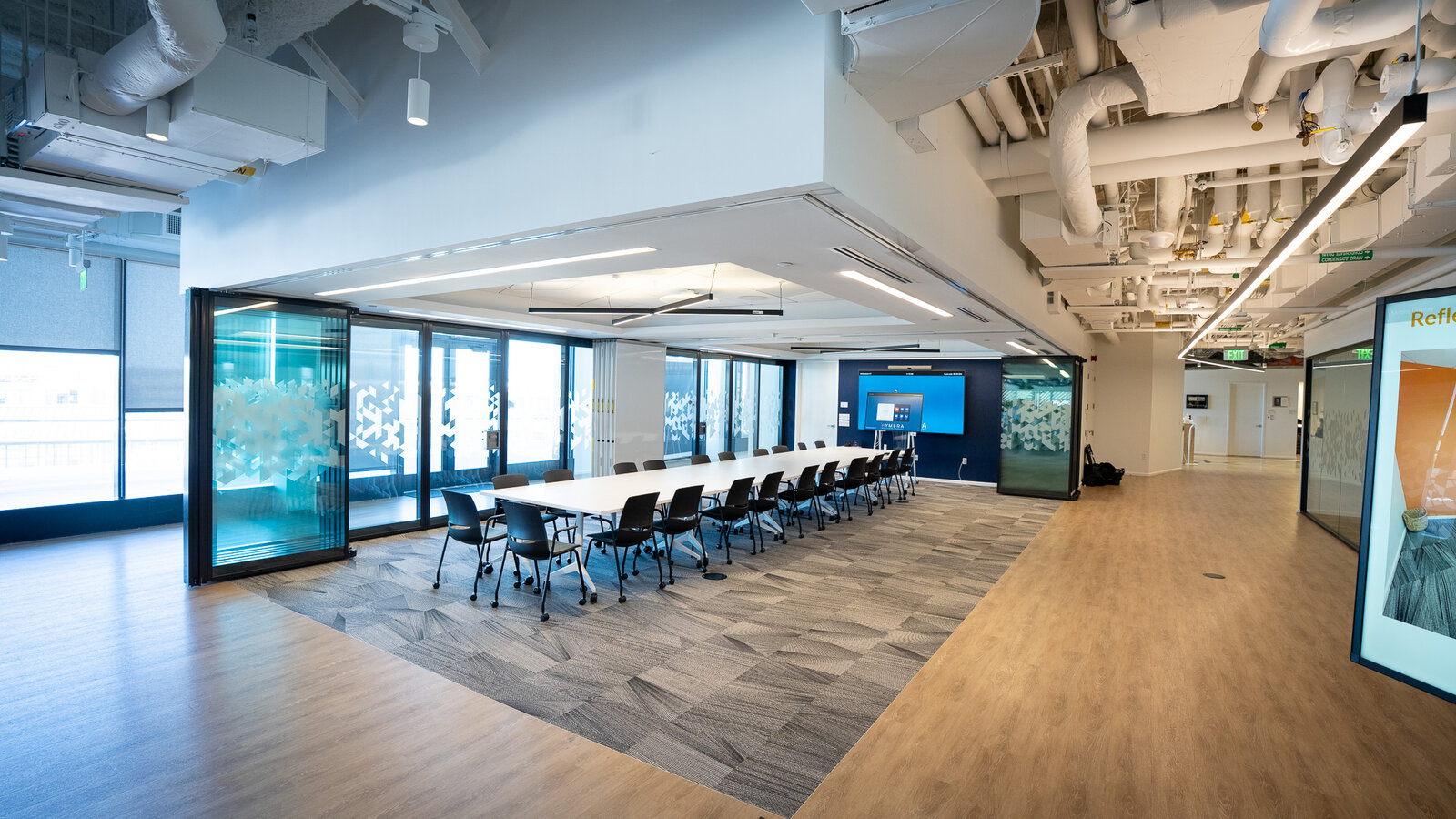 Modernfold Acousti-Clear Brings Flexible Meeting Space to a Boston Office Building