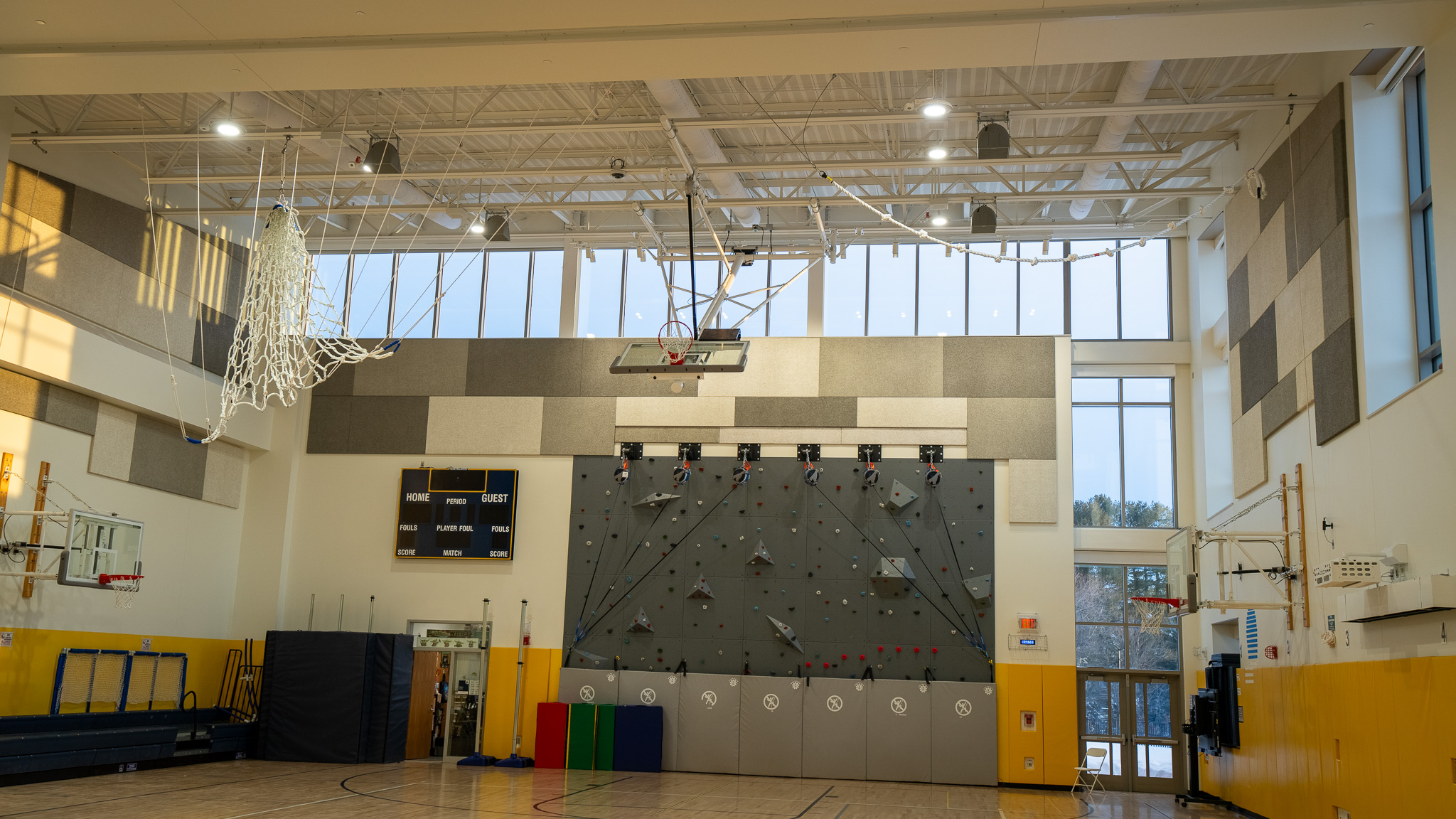 Draper gym equipment — basketball backstops and gym divider curtains